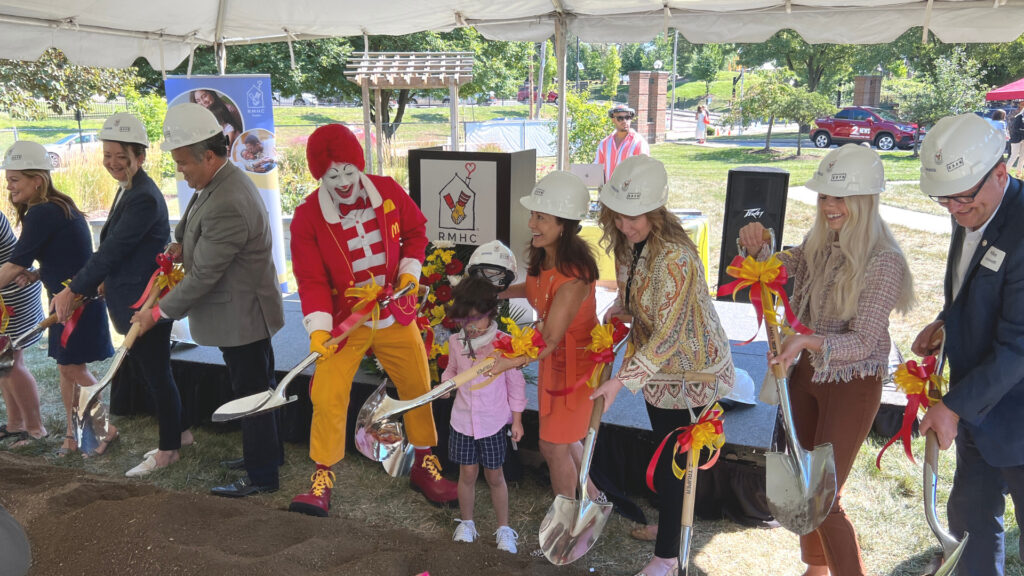 Ronald McDonald, members of Team Cramer and the Ronald McDonald House Charities Dayton campaign team holding shovels