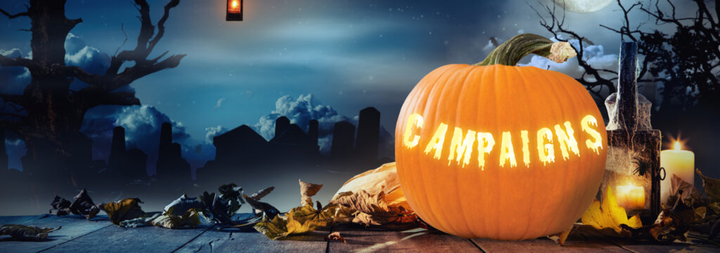 jack-o-lantern with glowing word "campaign" on dark, spooky background